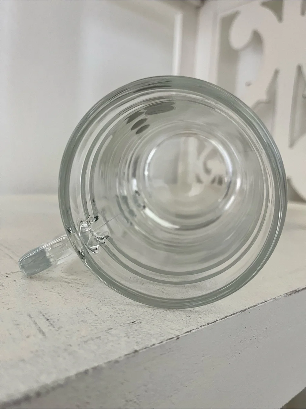Glass beer stein with an applied pewter American flag emblem